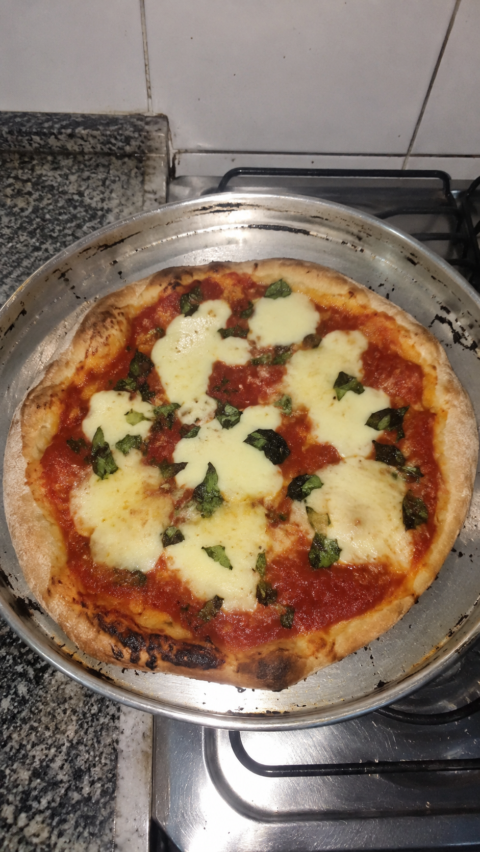 Pizza italiana preparada por uma aluna